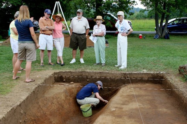 Dr. Alice Wright, talks to locals in  Haywood County NC, while I play in the dirt below - summer 2011.